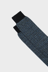 Close-up of the houndstooth pattern and hand-linked toe on Bresciani 'Attilio' socks, in blue and jeans color