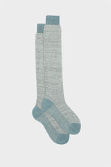 A pair of Bresciani 'Attilio' long socks in a cotton and linen blend, featuring a houndstooth pattern in teal and ivory.