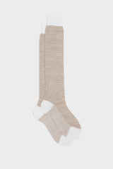 A pair of Bresciani 'Attilio' long socks in a cotton and linen blend, featuring a houndstooth pattern in beige and white