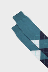 Close-up of the hand-linked toe and argyle intarsia pattern on Bresciani 'Luca' socks, showing the colors ocean blue and white.