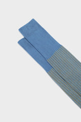 Close-up of the fine ribbed texture on the cuff of Bresciani Mario socks, in a avio yellow color.