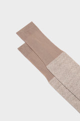 Close-up of the Lusitanian majolica inspired pattern and handmade bow on the toe of Bresciani Mattia socks, in wclay ivory blue.