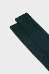 Close-up of the ribbed knit and fine texture of Bresciani 'Campidoglio' socks, in a solid forest green color.