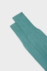 Close-up of the ribbed cuff on Bresciani Lorenzo socks, in a solid mint green color.