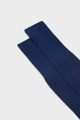Close-up of the fine ribbed texture on the cuff of Bresciani Mario socks, in a bluette black color.