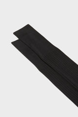 Close-up of the ribbed cuff on Bresciani Cesare socks, highlighting the high cuff and solid navy color.