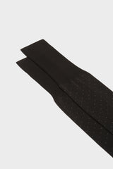 Close-up of the pindots pattern on the cuff of Bresciani Fabio socks, in a black color.