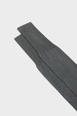 Close-up of the pindots pattern on the cuff of Bresciani Fabio socks, in a grey color.