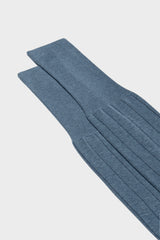 Close-up of the ribbed knit and cuff on Bresciani Leone socks, in a solid mid blue color.