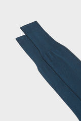 Close-up of the ribbed cuff on Bresciani Lorenzo socks, in a solid blue color.