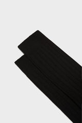 Close-up of the ribbed knit and hand-linked toe on Bresciani 'Lupo' socks, in a solid black color.