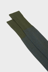 Close-up of the fine ribbed texture on the cuff of Bresciani Mario socks, in a dark green royal color.