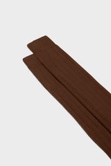 Close-up of the ribbed knit and hand-linked toe on Bresciani Massimo socks, in a solid chocolate color.