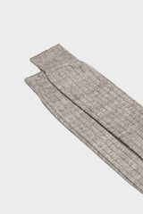 Close-up of the ribbed knit and hand-linked toe on Bresciani Valerio socks, in a solid brown color.