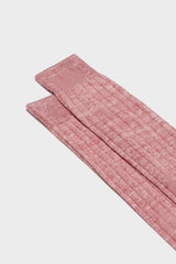 Close-up of the ribbed knit and hand-linked toe on Bresciani Valerio socks, in a solid red color.