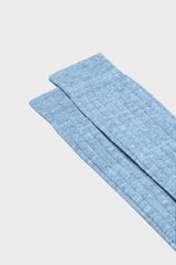 Close-up of the ribbed knit and hand-linked toe on Bresciani Valerio socks, in a solid sky color.