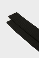 Close-up of the ribbed knit and fine texture of Bresciani 'Campidoglio' socks, in a solid black color.