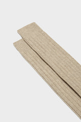 Close-up of the ribbed knit and fine texture of Bresciani 'Campidoglio' socks, in a solid light brown color.