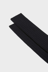 Close-up of the ribbed knit and fine texture of Bresciani 'Campidoglio' socks, in a solid navy color.