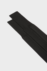 Close-up of the high cuff on Bresciani Celio socks, highlighting the single rib texture in a solid black color.