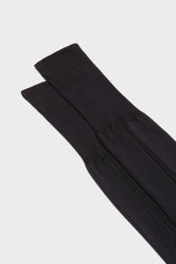 Close-up of the high cuff on Bresciani Celio socks, highlighting the single rib texture in a solid navy color.