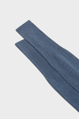 Close-up of the ribbed cuff on Bresciani Lorenzo socks, in a solid blue melange color.